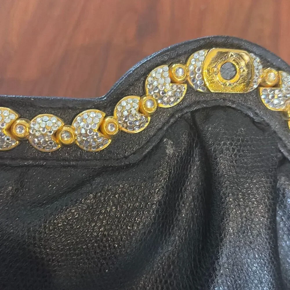 Richters Black leather vintage clutch with rhinestone detail